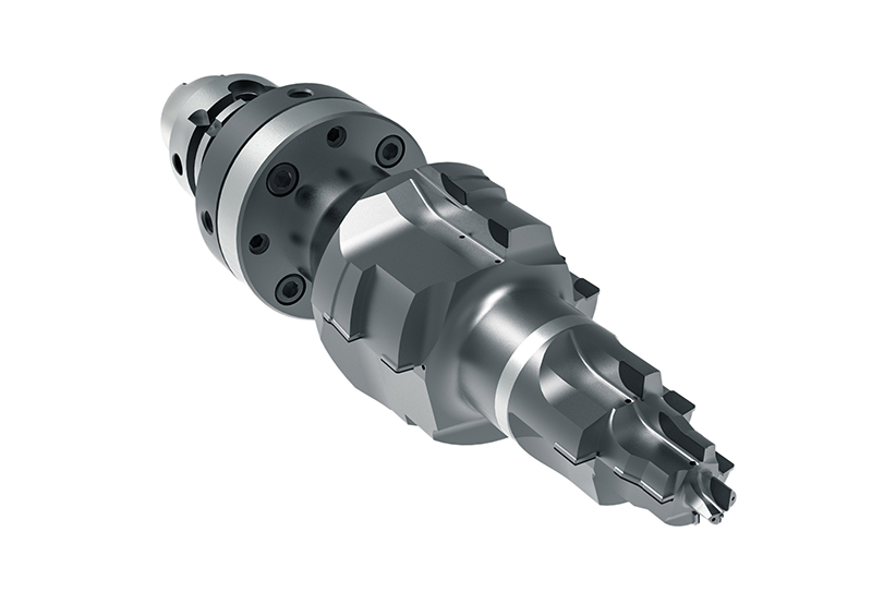 Ferramenta de PCD combinada complexa e escalonada concebida pela Mapal para maquinar os tr�s furos de rolamento e o furo da posi��o da base do...