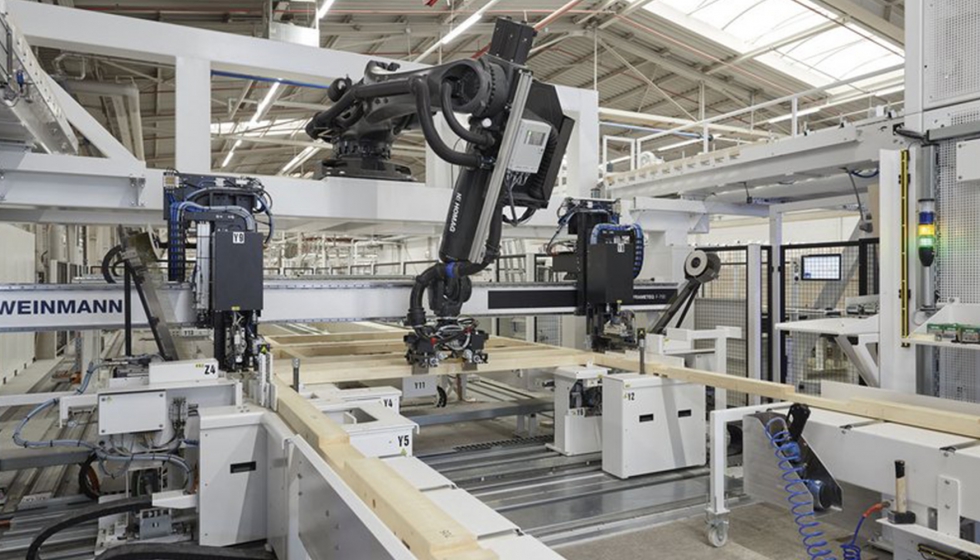 El robot inserta de forma totalmente automtica los pernos en el marco de trabajo. Foto: WeberHaus