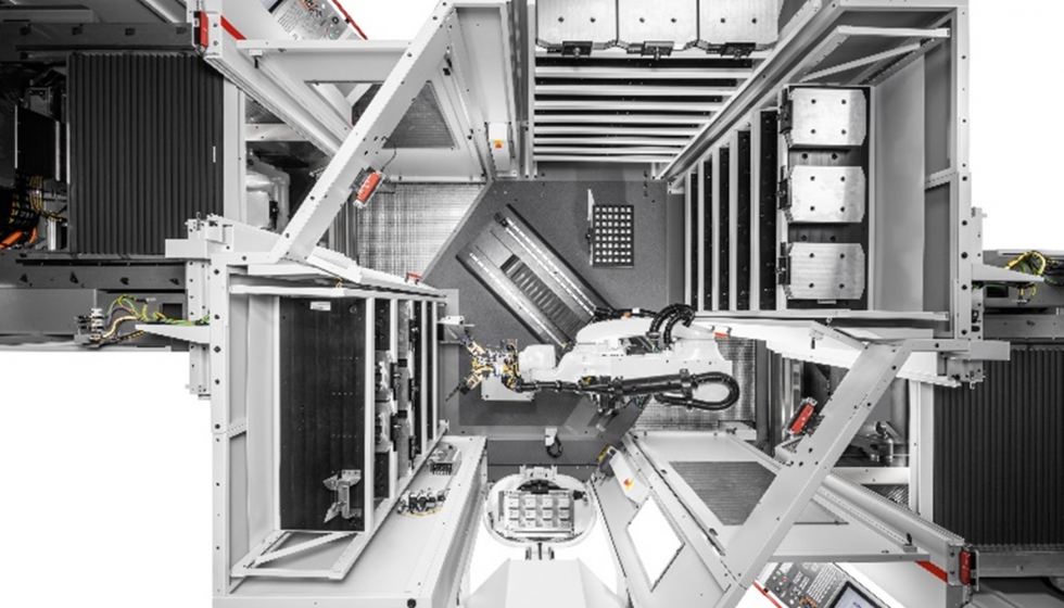 Vista desde arriba del sistema de robotizado RS 1 adaptado a dos centros de mecanizado C 22 U de Hermle a la izquierda y a la derecha  hasta tres...