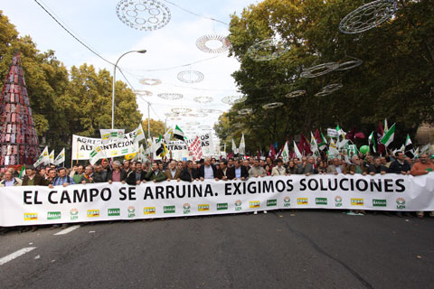 A large banner headed a demonstration peaceful and demanding