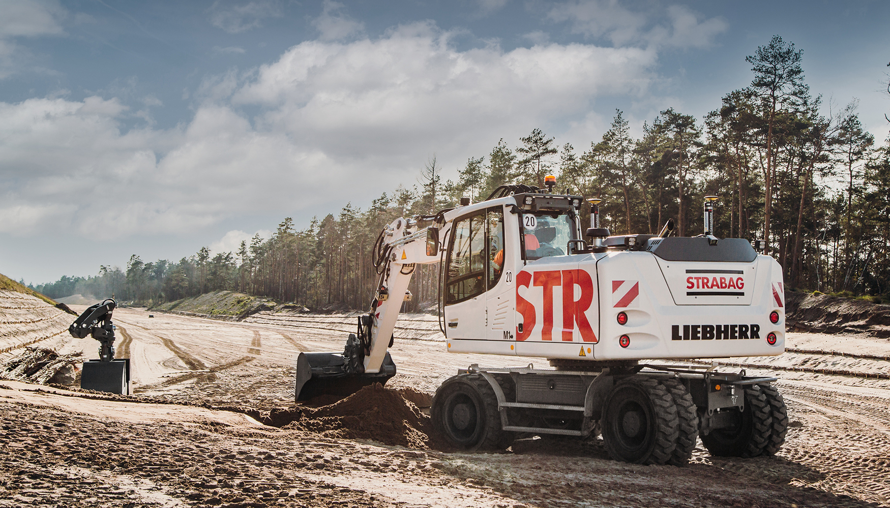 Strabag emplea el sistema de enganche rpido totalmente hidrulico Likufix en todas las mquinas existentes y nuevas de Liebherr...