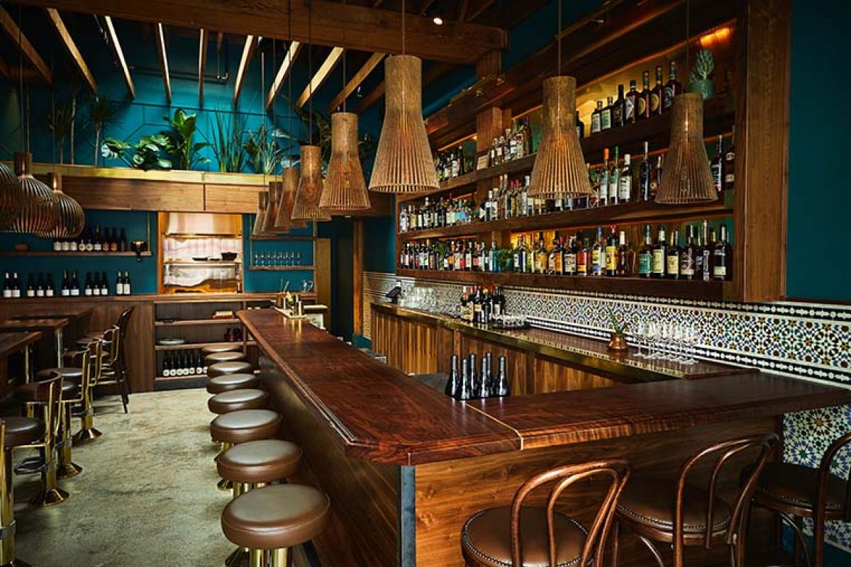 Heliotrope Architects designed Rupee Bar, the restaurant in Seattle inspired by India and Sri Lanka