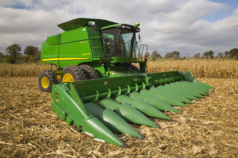 9870 STS Harvester produced by the factory of Harvester Works with 514 HP of power and head of corn in 12 rows