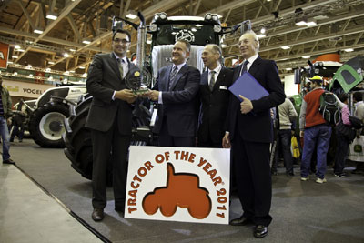 On behalf of AGCO/Fendt, Gary Collar and Johann Planatscher picked up the 'Tractor of the year 2011' award for the 828 Vario...