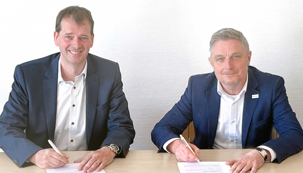 Bernd Hillbrands (izquierda), de Orgadata, y Jan Vandyck, de Unilink, en el momento de la firma del acuerdo...