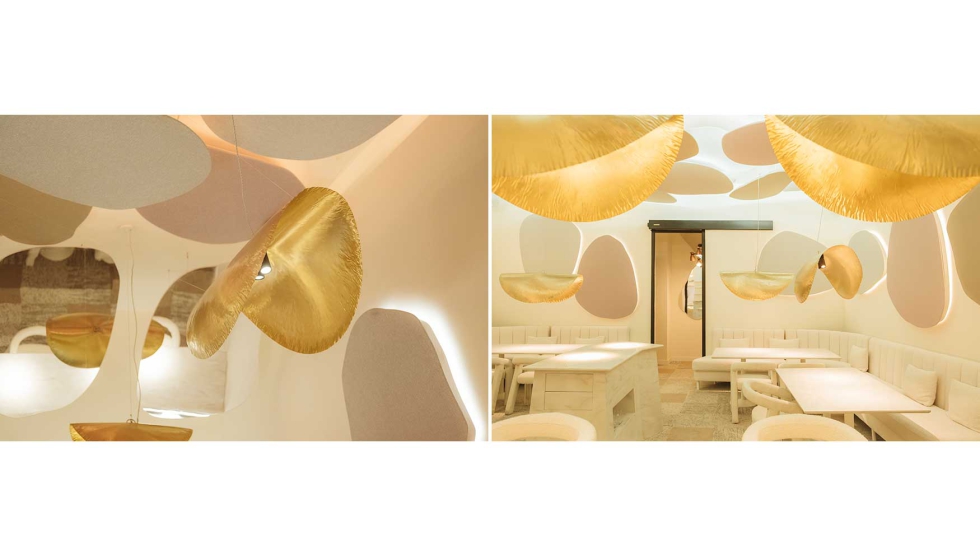 Detalle de una de las luminarias de lat�n con sus spots orientables y panor�mica de la composici�n que crea en este restaurante sofisticado y...