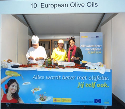 In the image, the stand of the Taste of Amsterdam fair olive oils