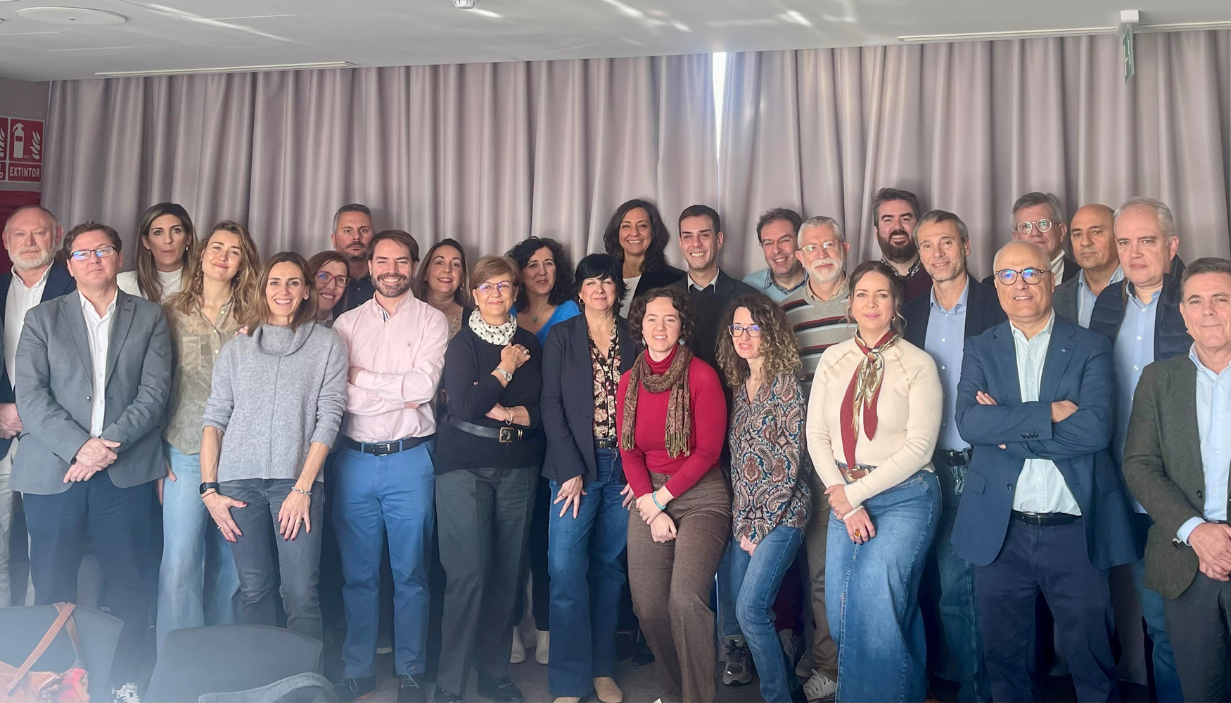 Foto de familia de los asistentes al tradicional desayuno de Signus