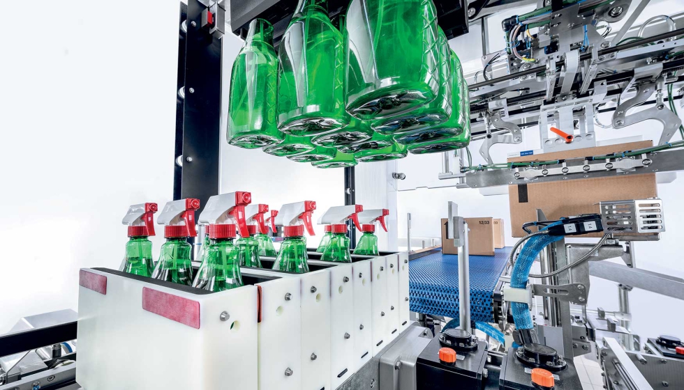 Pine Glo embala hasta doce botellas por caja con la lightline Casepacker Pine Glo embala hasta doce botellas por caja con la lightline Casepacker