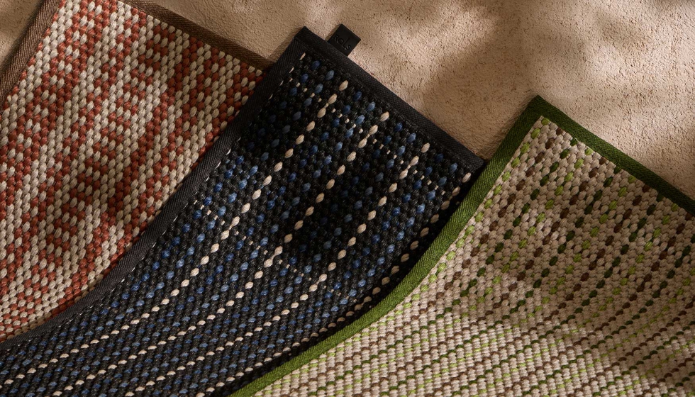 Alfombras fabricadas en telar de tejido plano con el principal componente PET a partir de botellas de pl�stico recicladas...