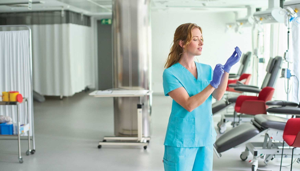 Las camisolas el�sticas Stretch mujer para sanidad mejoran el ajuste y la movilidad