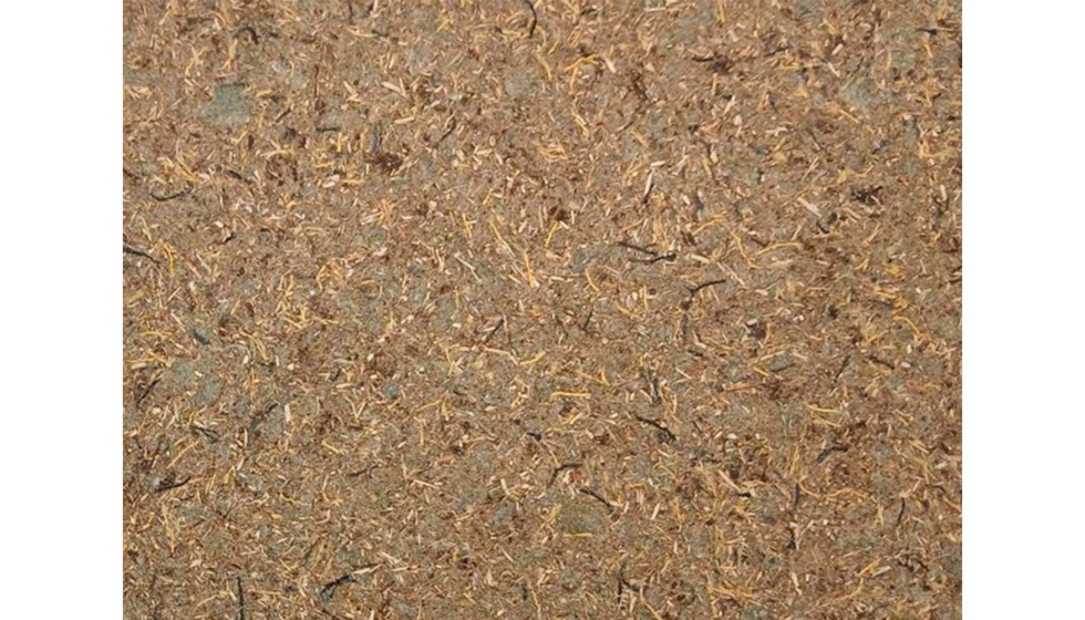 Material compuesto por partculas de madera y un 48% de residuo textil de aramida