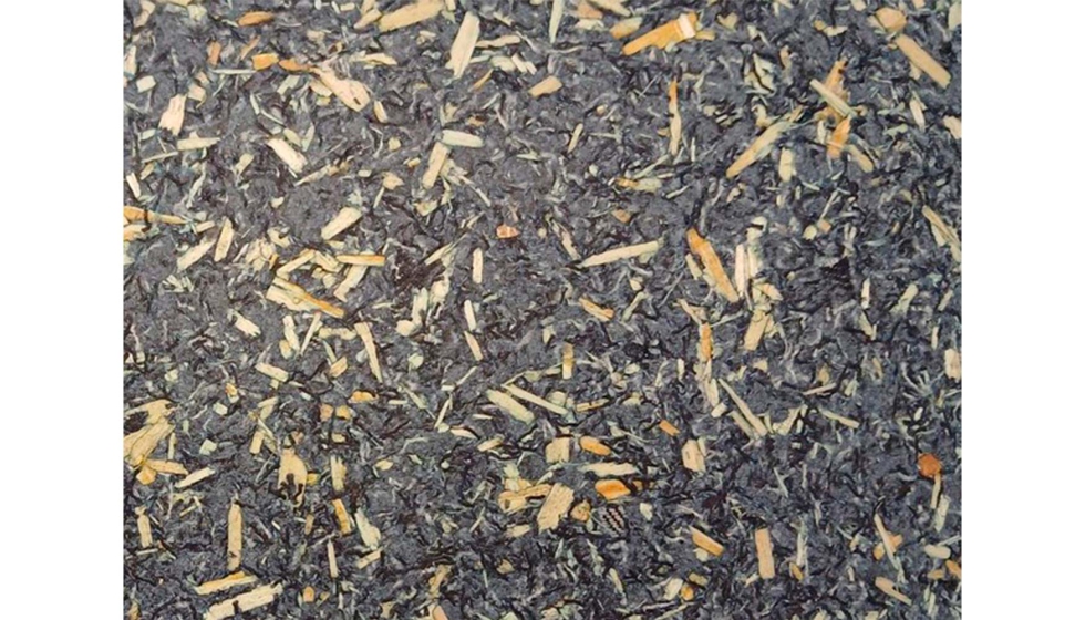 Material compuesto por un 56% de partculas de denim y 24% de fibras de madera
