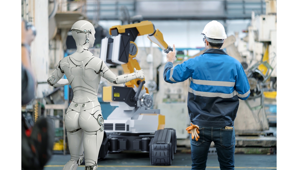 Robot humanoide interactuando interactuando con operarios en una planta de produccin