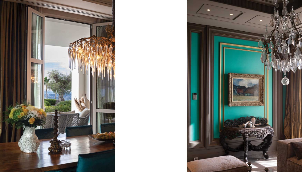 La vivienda incorpora inspiracin francesa, apoyado en molduras de madera, detalles dorados y lmparas de araa como elementos destacados...