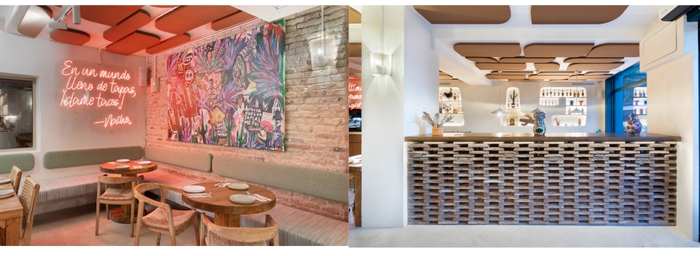 El detalle interior del espacio con nen y mural cromtico como puntos focales se presenta como un estilo industrial. Fotografa: David Querol...