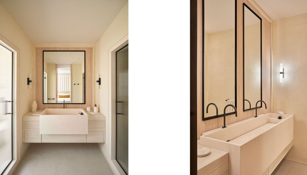 Los lavabos de piedra caliza, que aportan peso t�ctil y una presencia serena...