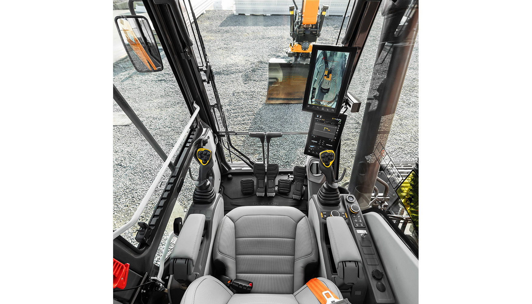 Interior de la cabina de una excavadora de la Serie 9