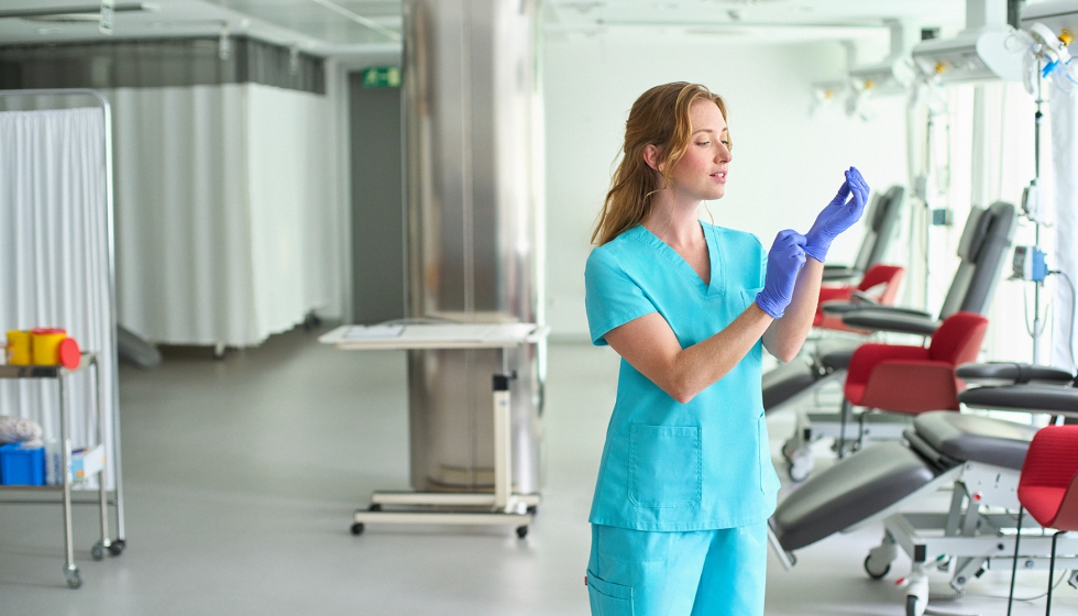 Las camisolas el�sticas Stretch mujer para sanidad mejoran el ajuste y la movilidad