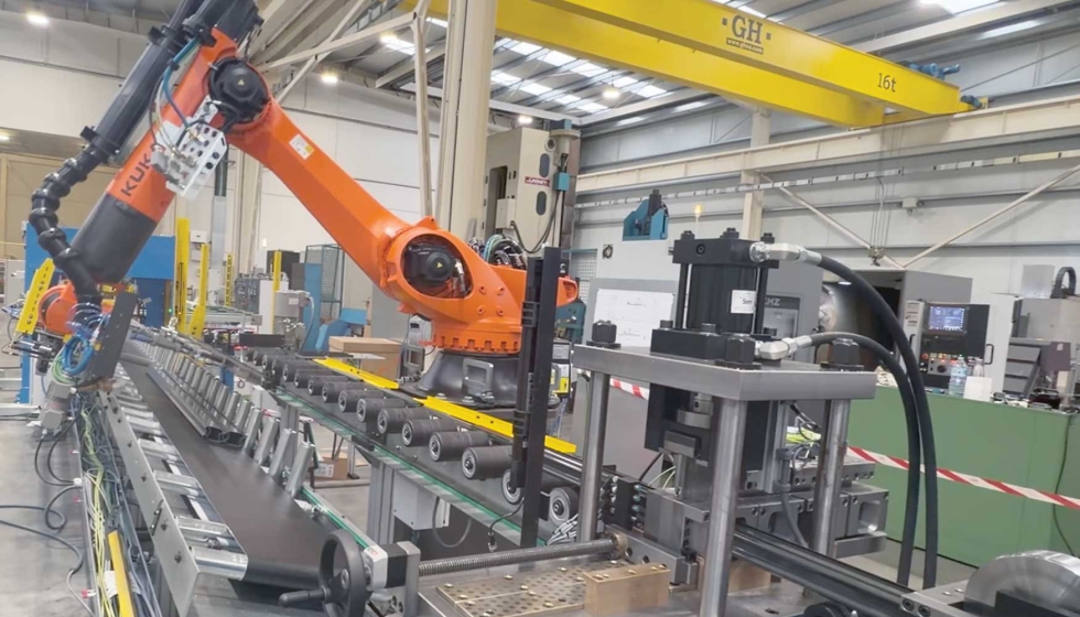 Robot de apilado integrado a una l�nea de perfilado de aluminio