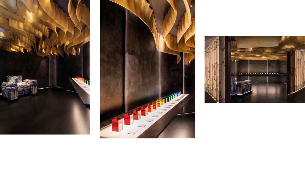 En el espacio conceptual 'El valor de lo invisible' se emplea en la superficie de la mesa central y en los revestimientos interiores...