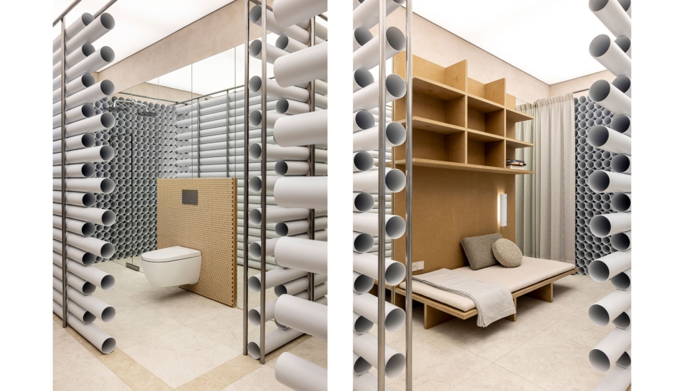 Los tubos de pol�mero industrial se transforman en una celos�a r�tmica y funcional que permite destacar elementos como el inodoro bid� Geberit...