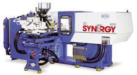 At the fair you can see a Synergy 2 c with mold 4 + 4, making covers of two components in a cycle of 22 s