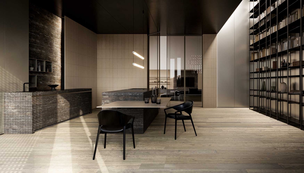 Twenty Lab pone la materia en el centro del ambiente de la cocina, transformando el volumen en piedra en una presencia arquitect�nica profunda...