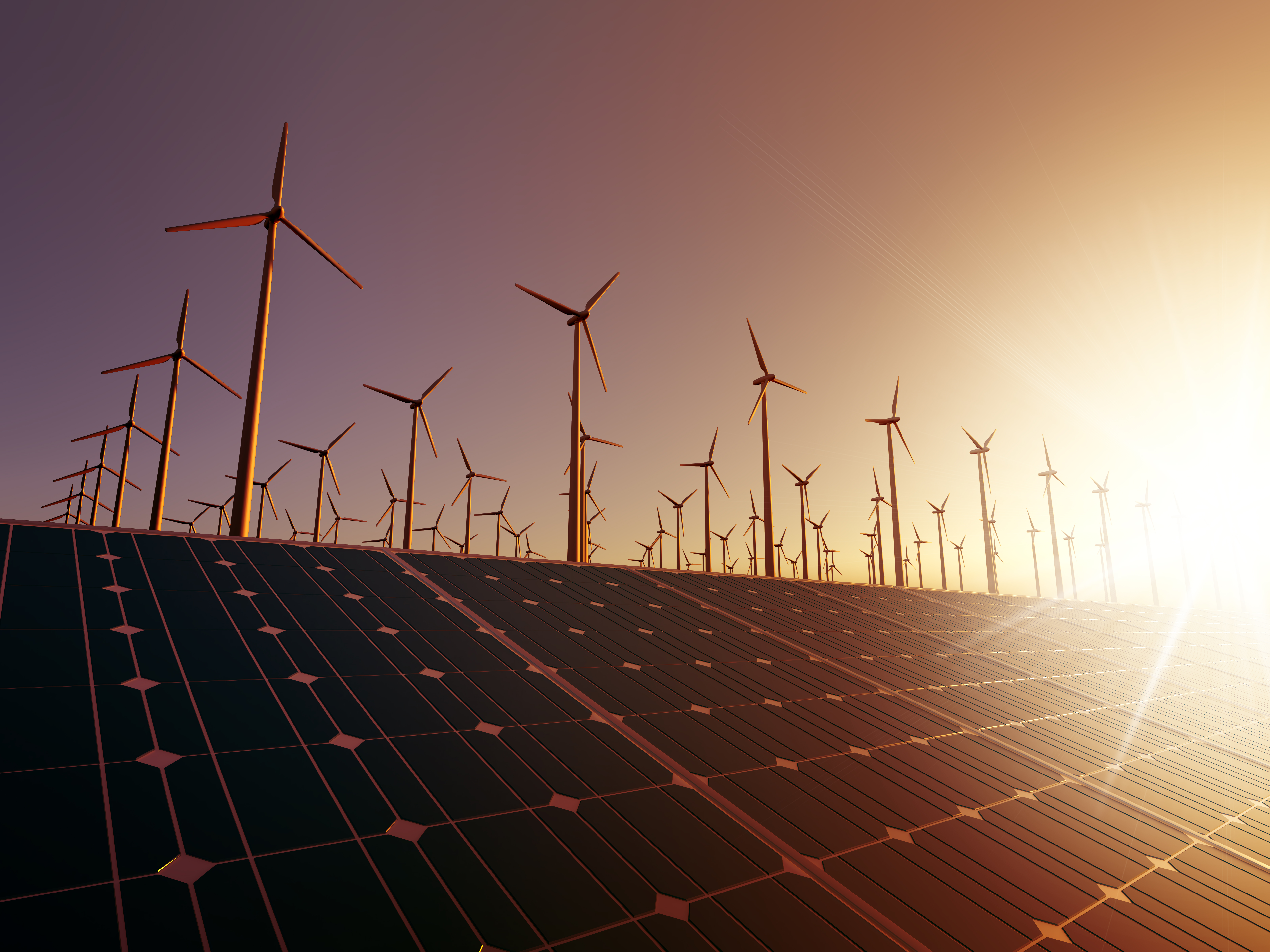 Molinos de viento sobre placas solares