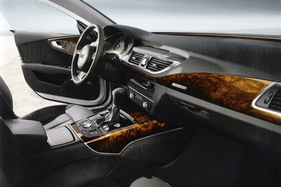 Photo2. Image of surfaces with enchapados wooden in the interior of a car of first level. Photo: Porsche Austria GmbH & Co OG...