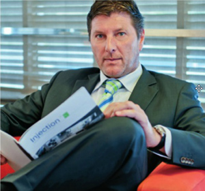 In the image poses Bernd Roegele, manager of the company