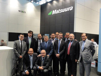 Representatives of Maquinser in the stand of the company in the EMO of Hannover