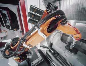 El robot incluye un dispositivo de agarre doble y una unidad de cortado y rectificado, en segundo plano